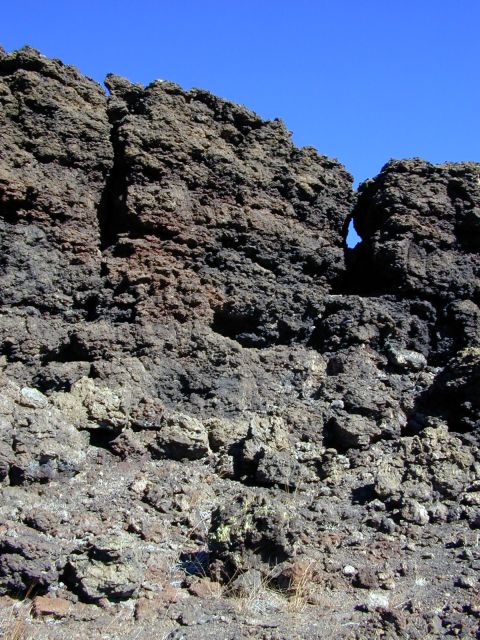 Extension cracks below the rim