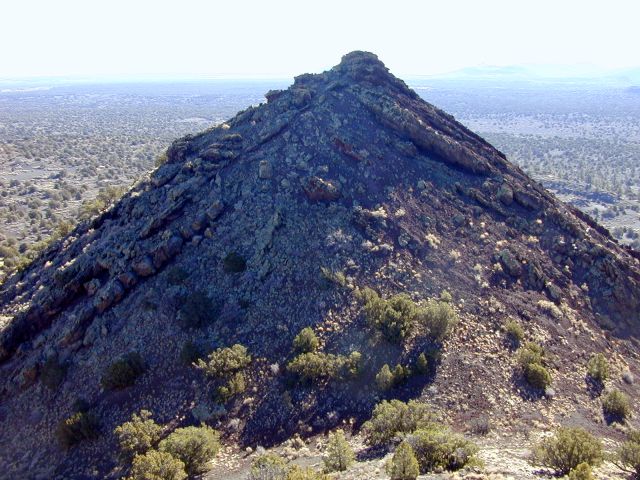 Inward and outward-dipping agglutinate and rootless flows east of the gap