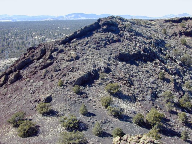 Inward and outward-dipping agglutinate and rootless flows west of the gap
